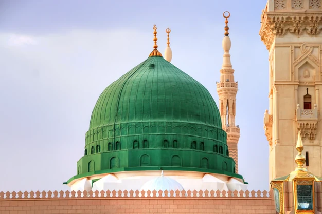 Green Dome of Masjid-e-Nabawi in Madinah, an iconic landmark visited by Muslim pilgrims during their Umrah journey.