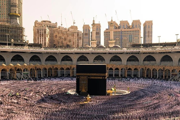 Thousands of Muslim pilgrims performing Tawaf around the Holy Kaaba in Makkah, Saudi Arabia during Hajj and Umrah pilgrimage.