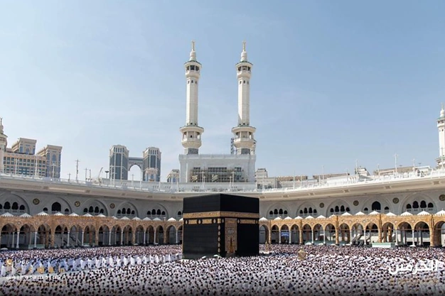 Daytime view of the Kaaba at Masjid Haram in Makkah, where Muslim pilgrims perform Tawaf during their Umrah and Hajj pilgrimage.